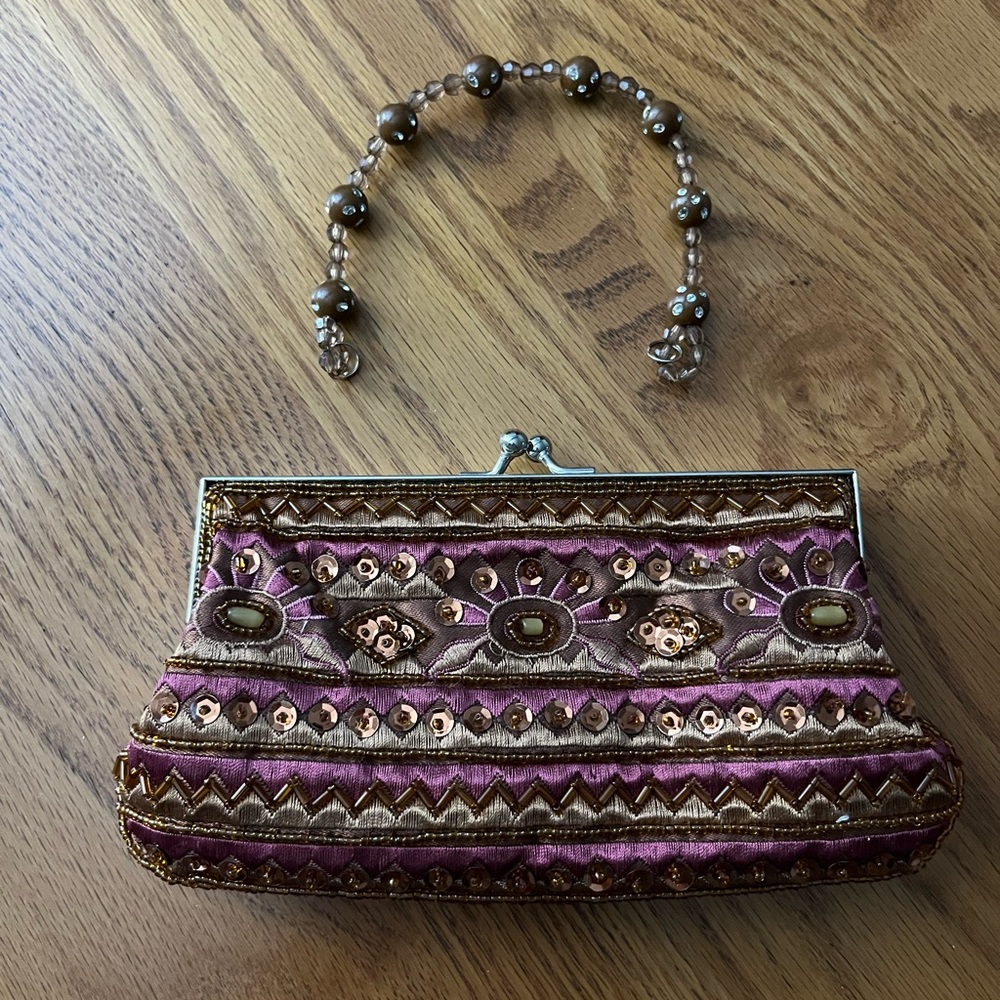 Cute Far Nine beaded satin clutch with detachable beaded handle.